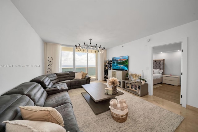 living room featuring an inviting chandelier