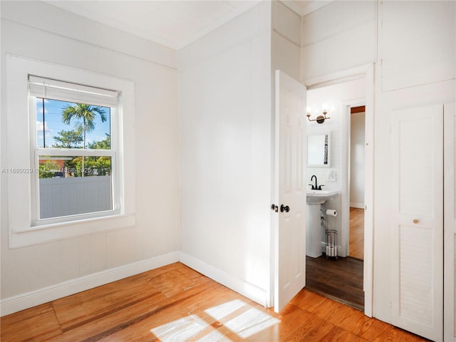 corridor featuring hardwood / wood-style flooring