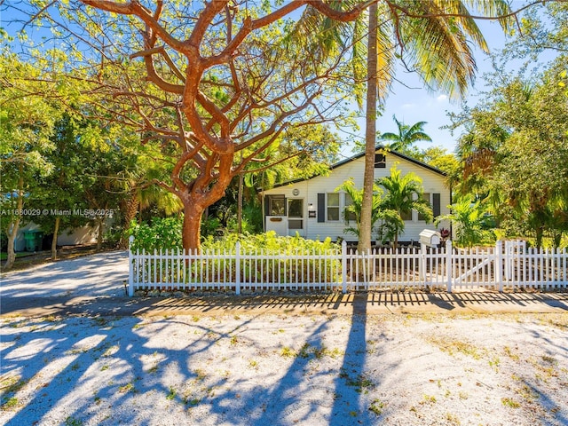 view of property exterior featuring a fenced front yard