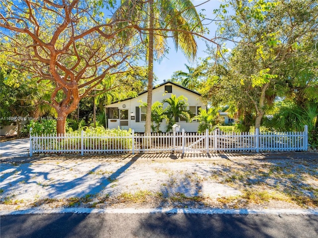 view of property exterior featuring a fenced front yard