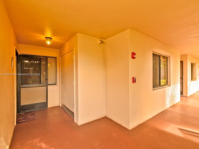 doorway to property featuring a patio area