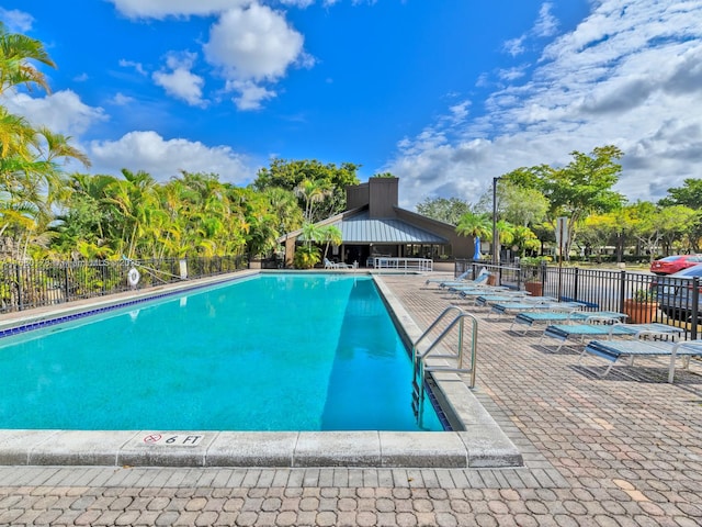 view of pool featuring a gazebo and a patio area