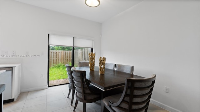 dining space with light tile patterned floors