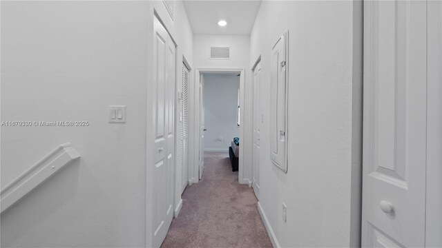 staircase featuring tile patterned flooring