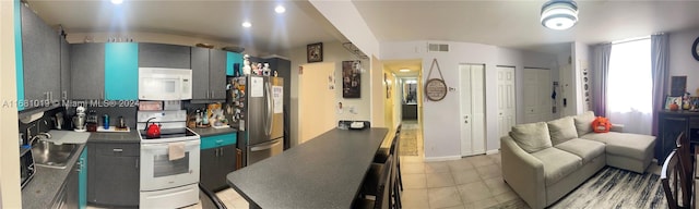 kitchen with white appliances and sink