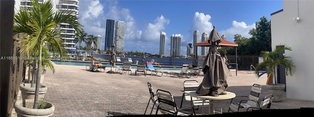 view of patio / terrace featuring a community pool