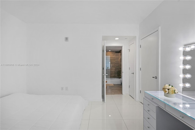 bathroom with vanity and tile patterned floors