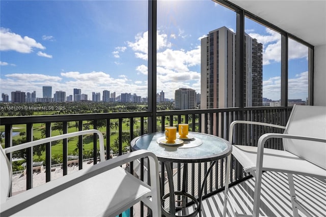 balcony featuring a city view