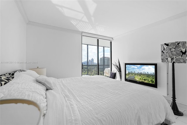 bedroom featuring ornamental molding, access to outside, tile patterned flooring, and a wall of windows