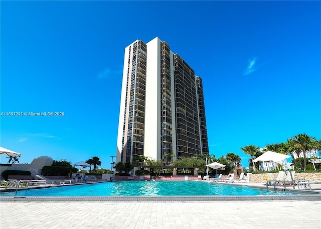 pool featuring a patio area