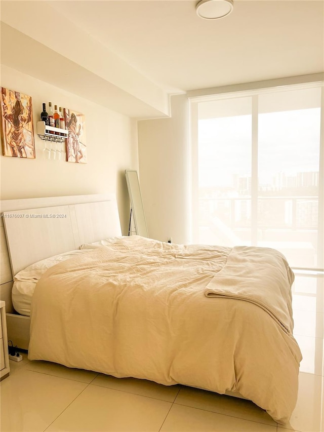 bedroom with tile patterned floors