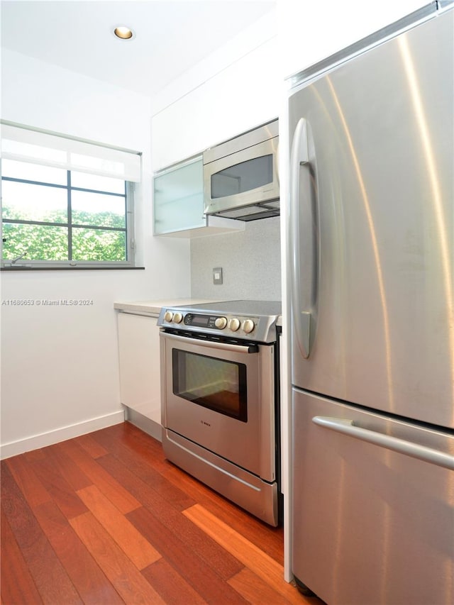 kitchen featuring light hardwood / wood-style flooring and stainless steel appliances