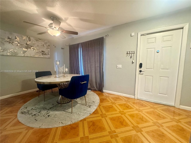 dining space with ceiling fan