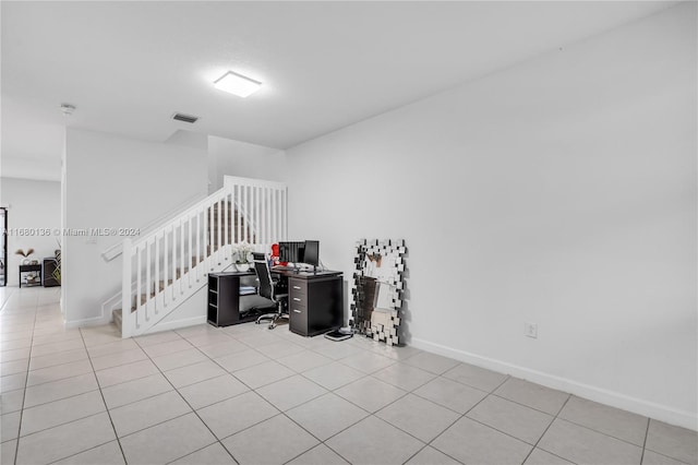 interior space with tile patterned floors