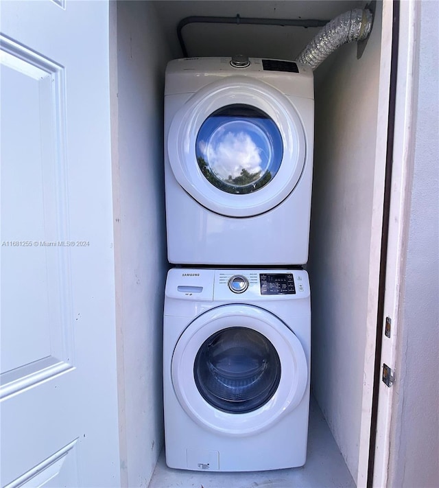 washroom with stacked washer / dryer