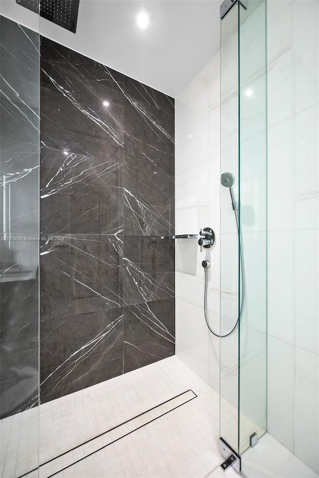 bathroom with an enclosed shower