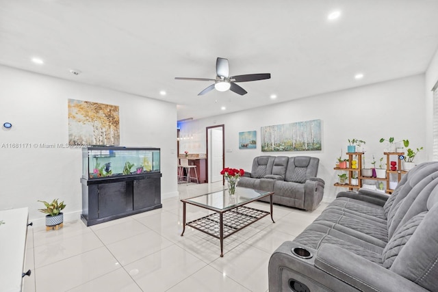 tiled living room featuring ceiling fan