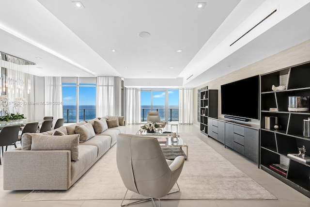 living room featuring floor to ceiling windows