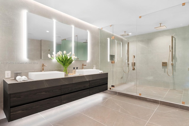 bathroom featuring vanity, tile walls, and an enclosed shower