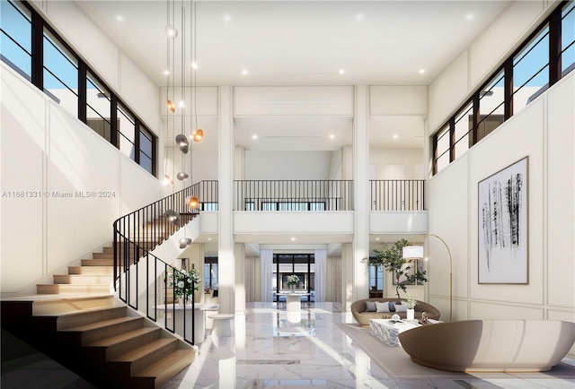 entrance foyer featuring a high ceiling