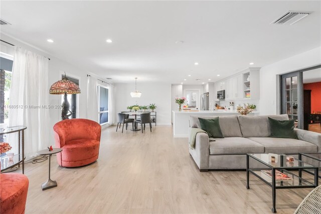 living room featuring light hardwood / wood-style floors