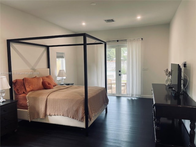 bedroom featuring access to exterior, french doors, and dark wood-type flooring