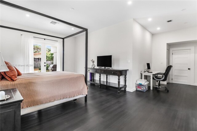 bedroom featuring access to exterior, french doors, and dark hardwood / wood-style floors