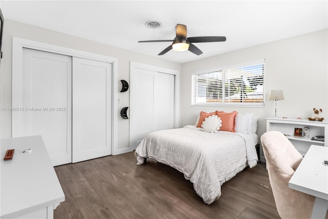 bedroom with ceiling fan and dark hardwood / wood-style flooring