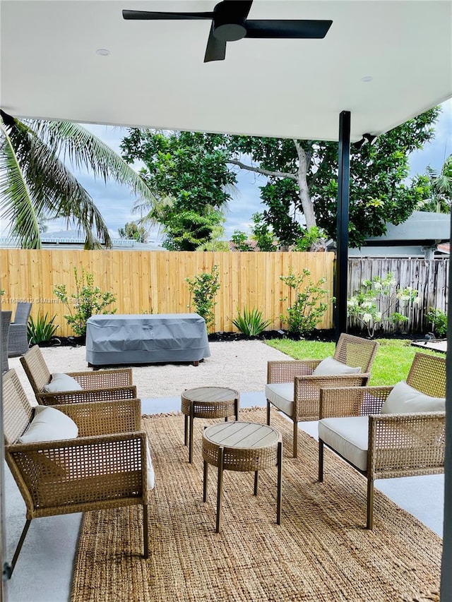 view of patio / terrace with grilling area and ceiling fan