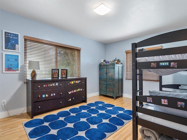 bedroom featuring wood-type flooring