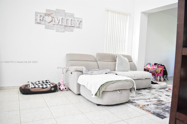 living room with light tile patterned flooring