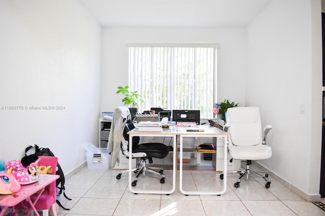 home office with light tile patterned floors