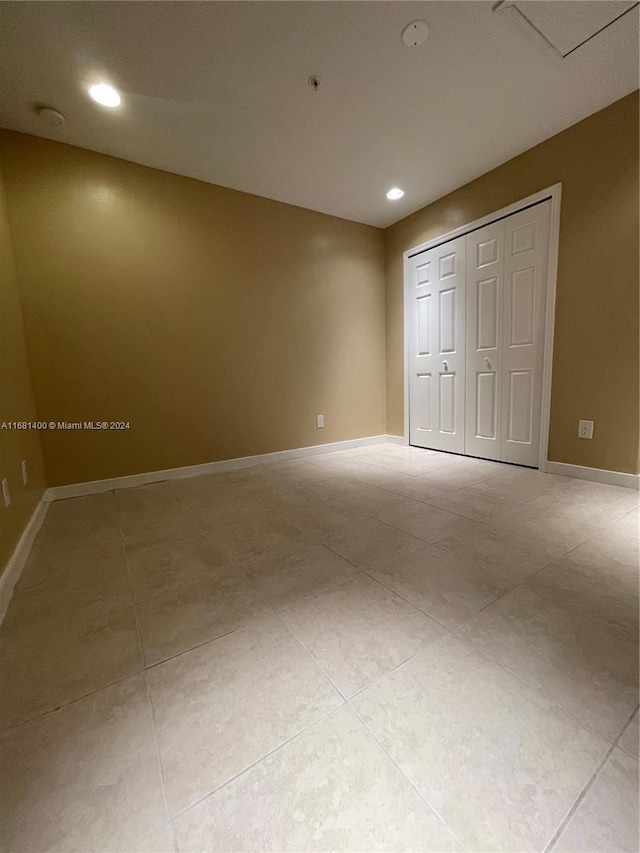 unfurnished bedroom featuring a closet