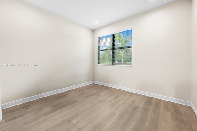 unfurnished room featuring light hardwood / wood-style flooring