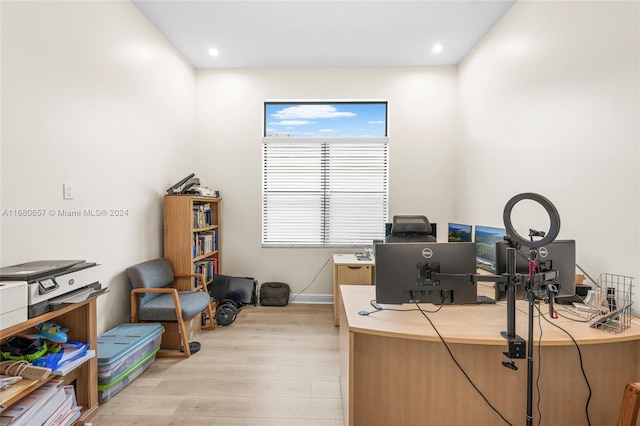 home office featuring light hardwood / wood-style floors