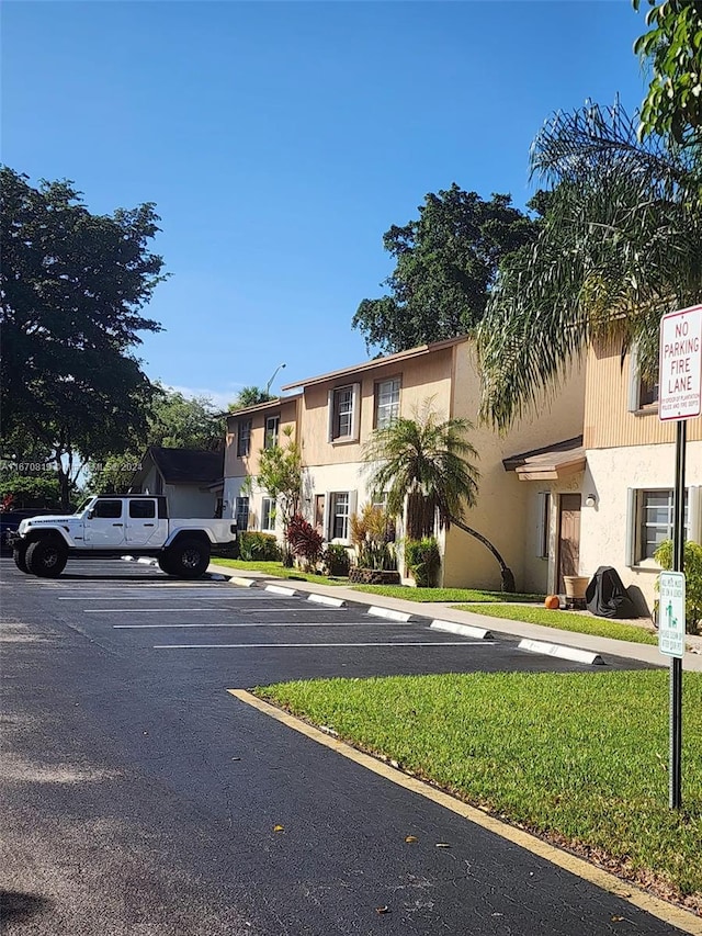 view of front of house with a front lawn