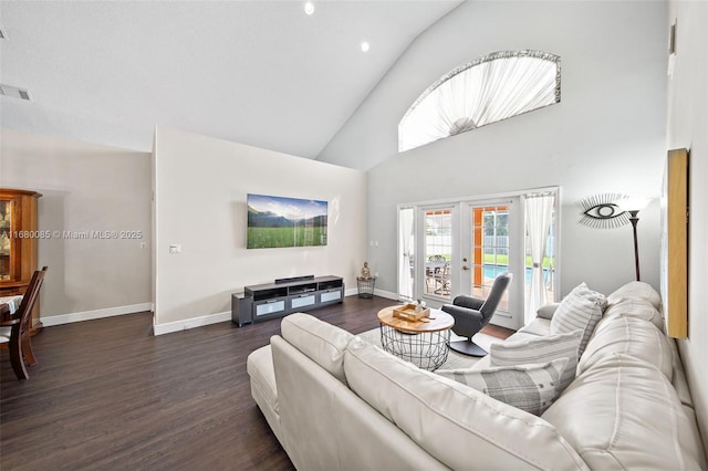 living area with high vaulted ceiling, visible vents, baseboards, french doors, and dark wood-style floors