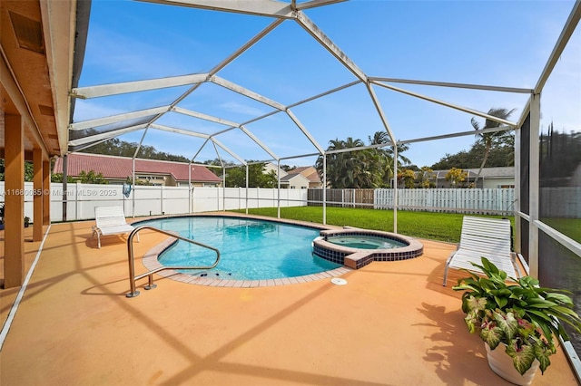 view of pool with a lanai, a patio area, a fenced backyard, and a pool with connected hot tub