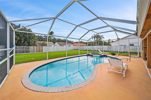 view of pool featuring a lanai, a patio area, a fenced backyard, and a pool with connected hot tub