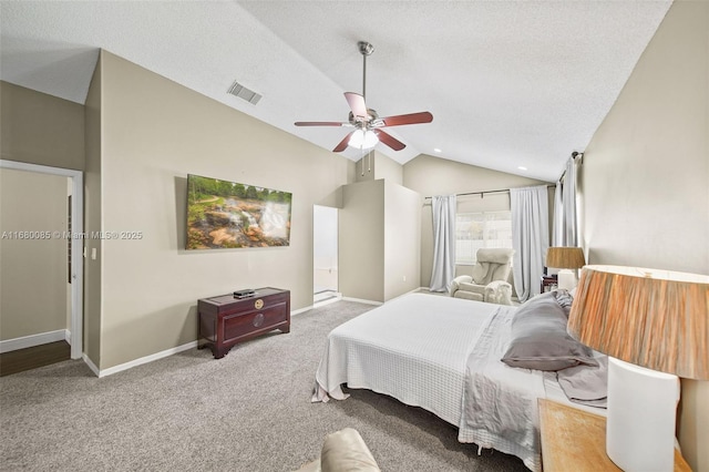 bedroom featuring carpet floors, lofted ceiling, visible vents, and baseboards