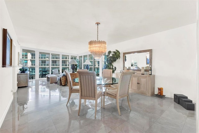 dining room with an inviting chandelier and floor to ceiling windows