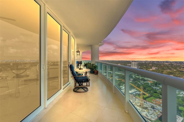 view of balcony at dusk