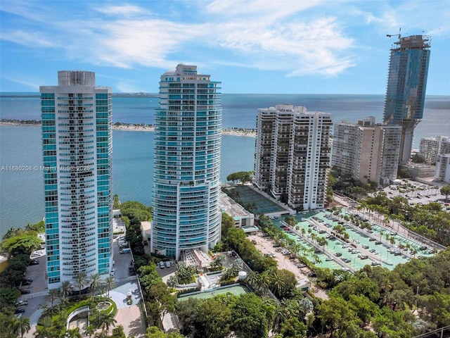 bird's eye view featuring a water view and a city view