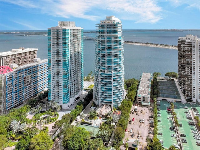 bird's eye view featuring a water view and a view of city