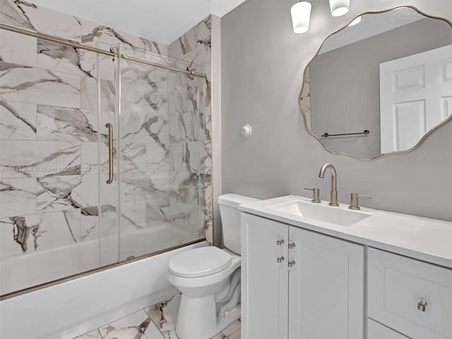 full bathroom with vanity, toilet, and enclosed tub / shower combo