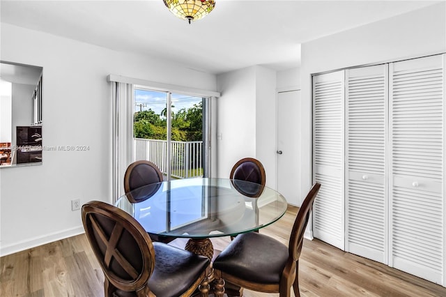 dining room with light hardwood / wood-style floors