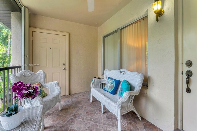 442 Pine Glen Ln Unit D-2, Green Acres, FL 33463 - property entrance featuring stucco siding and a balcony