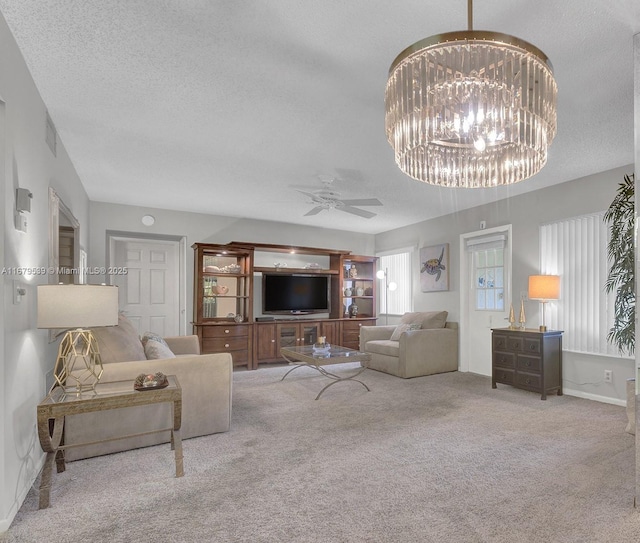 442 Pine Glen Ln Unit D-2, Green Acres, FL 33463 - living room with a textured ceiling, carpet, ceiling fan, and baseboards