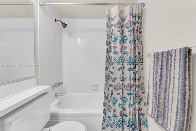 bathroom featuring shower / bathtub combination with curtain and toilet