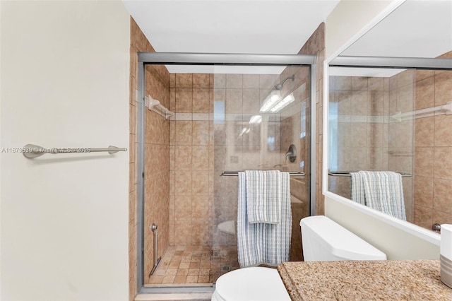 442 Pine Glen Ln Unit D-2, Green Acres, FL 33463 - full bathroom with toilet, a shower stall, and vanity